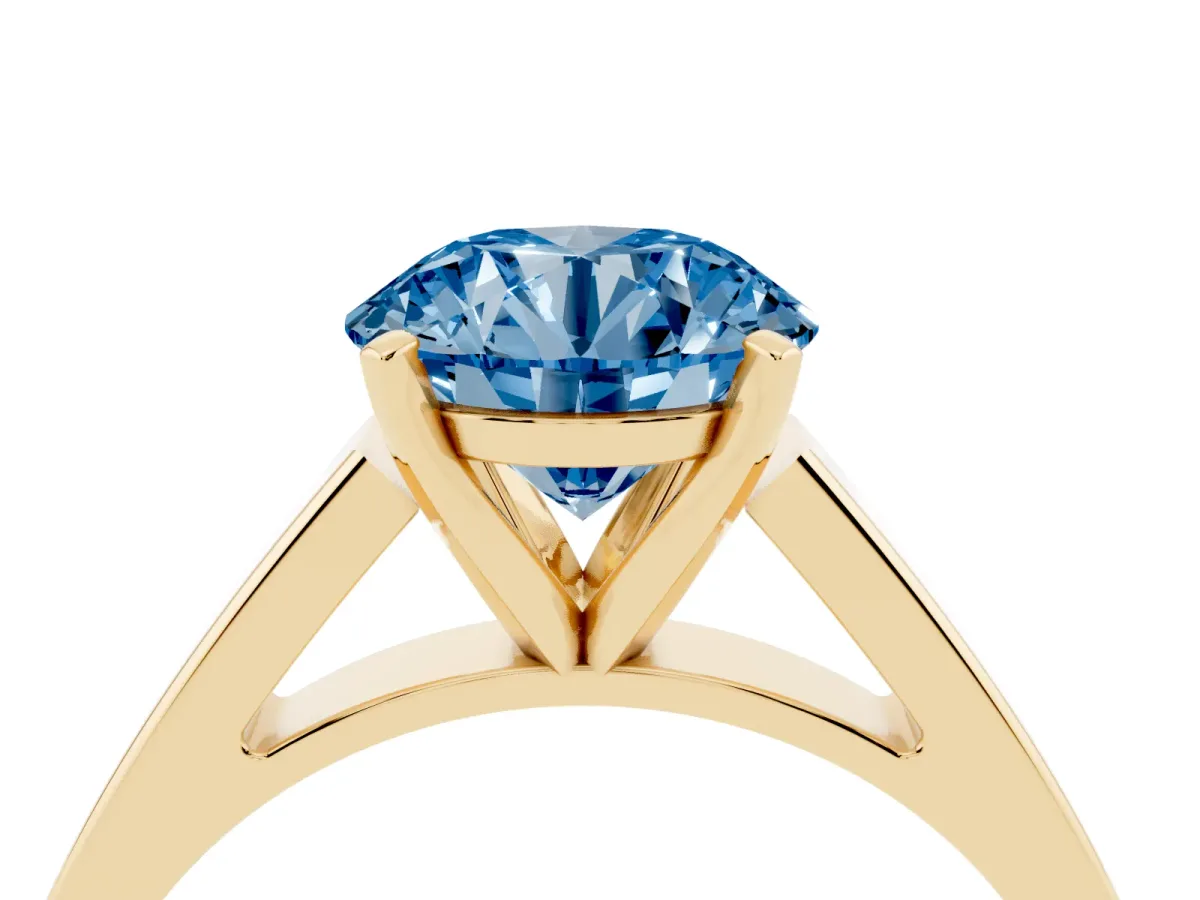 Fancy Blue Round Cut Solitaire Engagement Ring with Four-Prong Setting and Tapered Band Yellow gold
