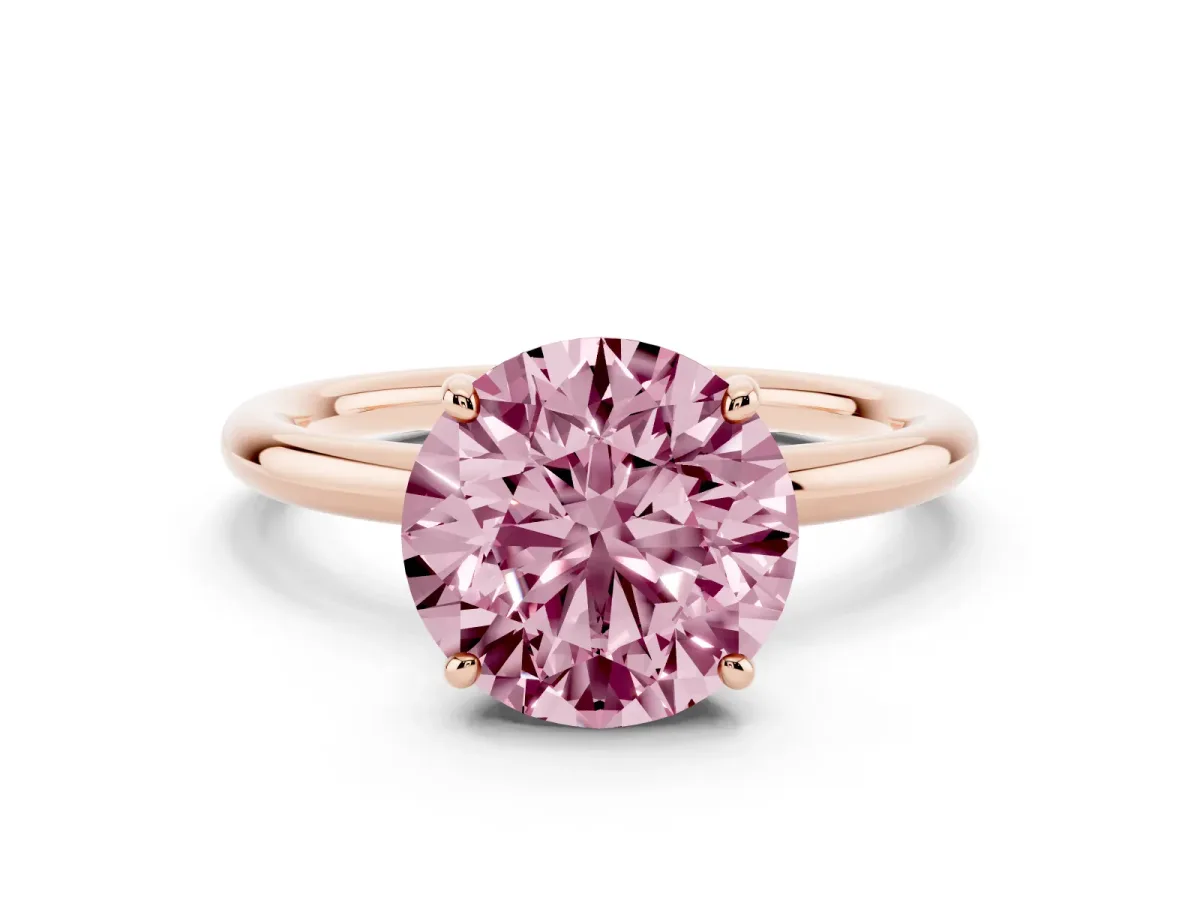 Fancy Pink Round Cut Solitaire Diamond Ring with Four-Prong Setting on a Plain Band Rose gold