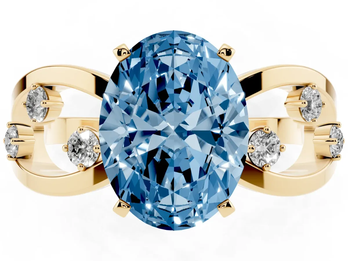 Fancy Blue Oval Cut Cut Solitaire Diamond with Side Stones on Criss-Cross Band and Four-Prong Setting Yellow gold