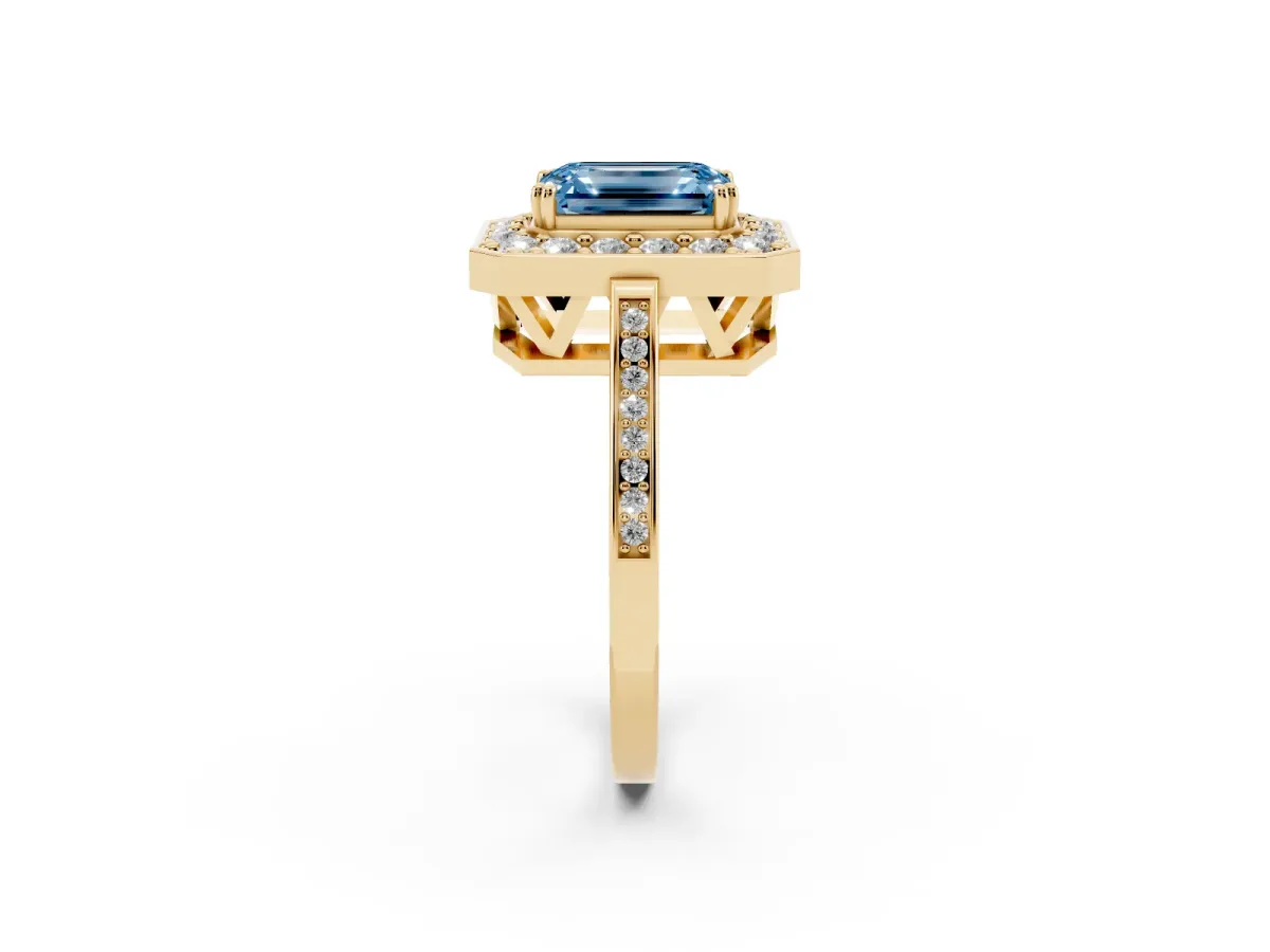 Fancy Blue Emerald Cut Diamond Halo Ring with Split Shank and Four-Prong Setting Yellow gold