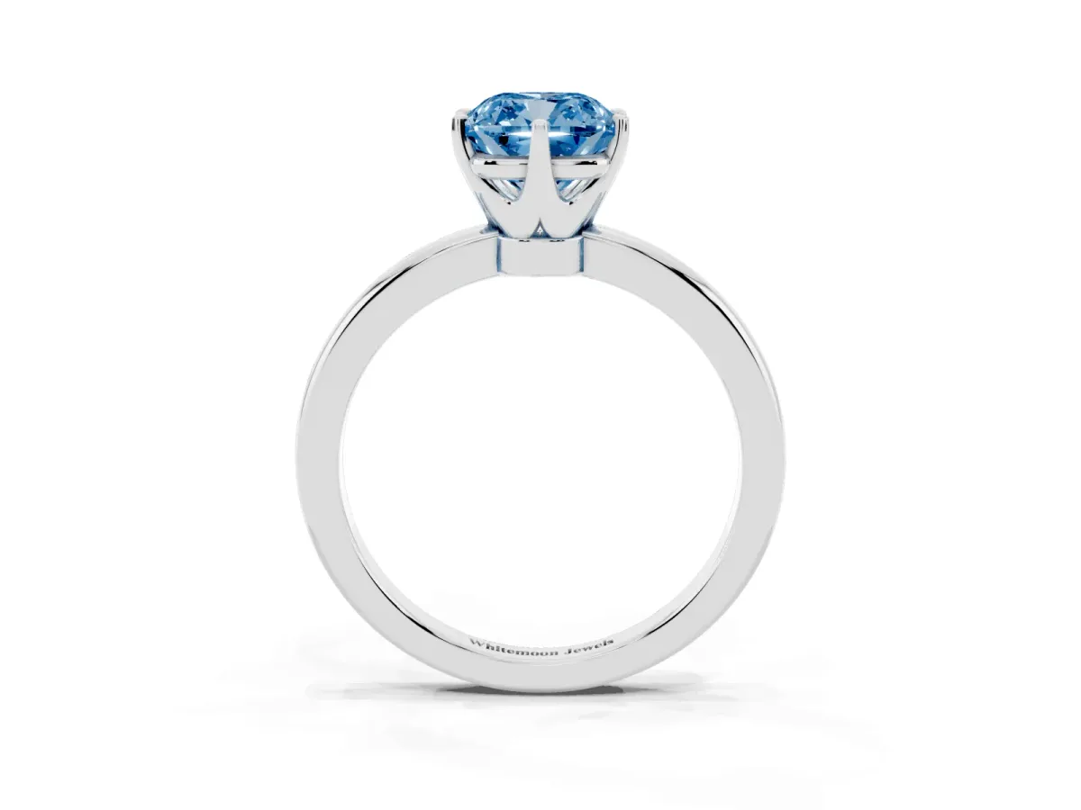 Fancy Blue Cushion Cut Solitaire Diamond Ring with Six-Prong Setting on a Classic Band Platinum