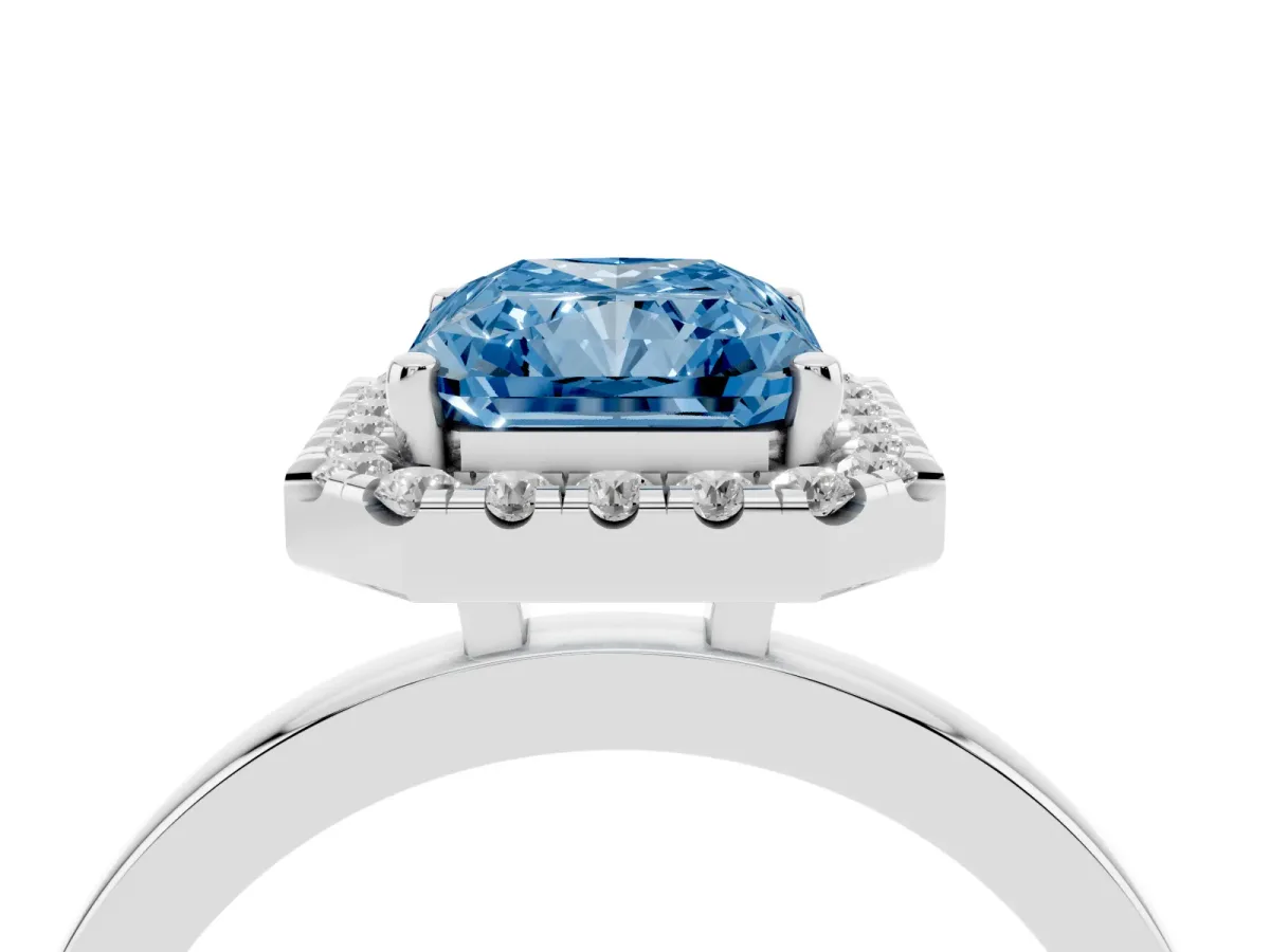 Fancy Blue Radiant Cut Halo Diamond Solitaire with Pavé Band and Four-Prong Setting White gold