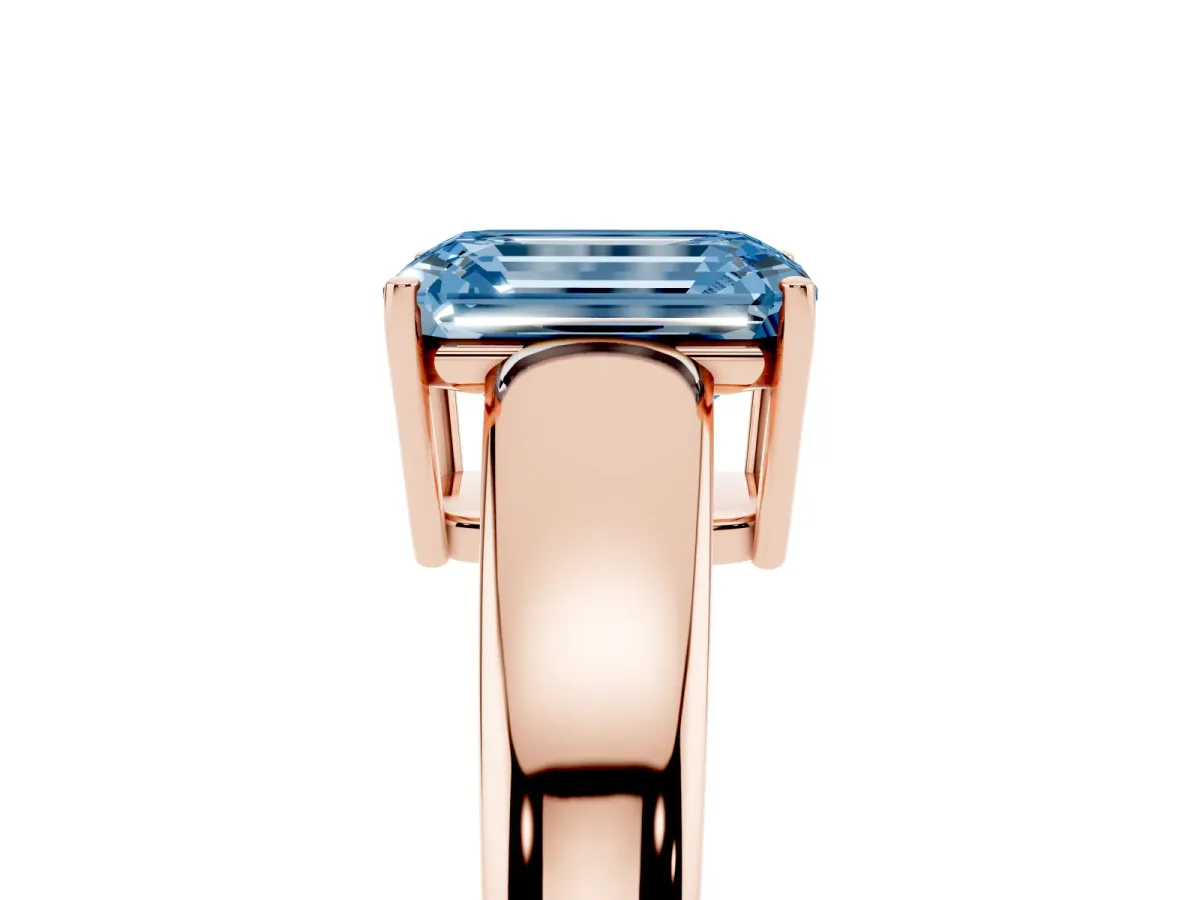 Fancy Blue Emerald Cut Solitaire Diamond Ring with Tapered Band and Four-Prong Setting Rose gold