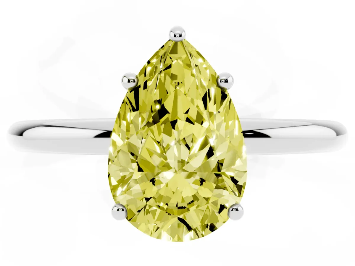 Fancy Yellow Pear Cut Solitaire Diamond Ring with a Classic Band and Four-Prong Setting Silver