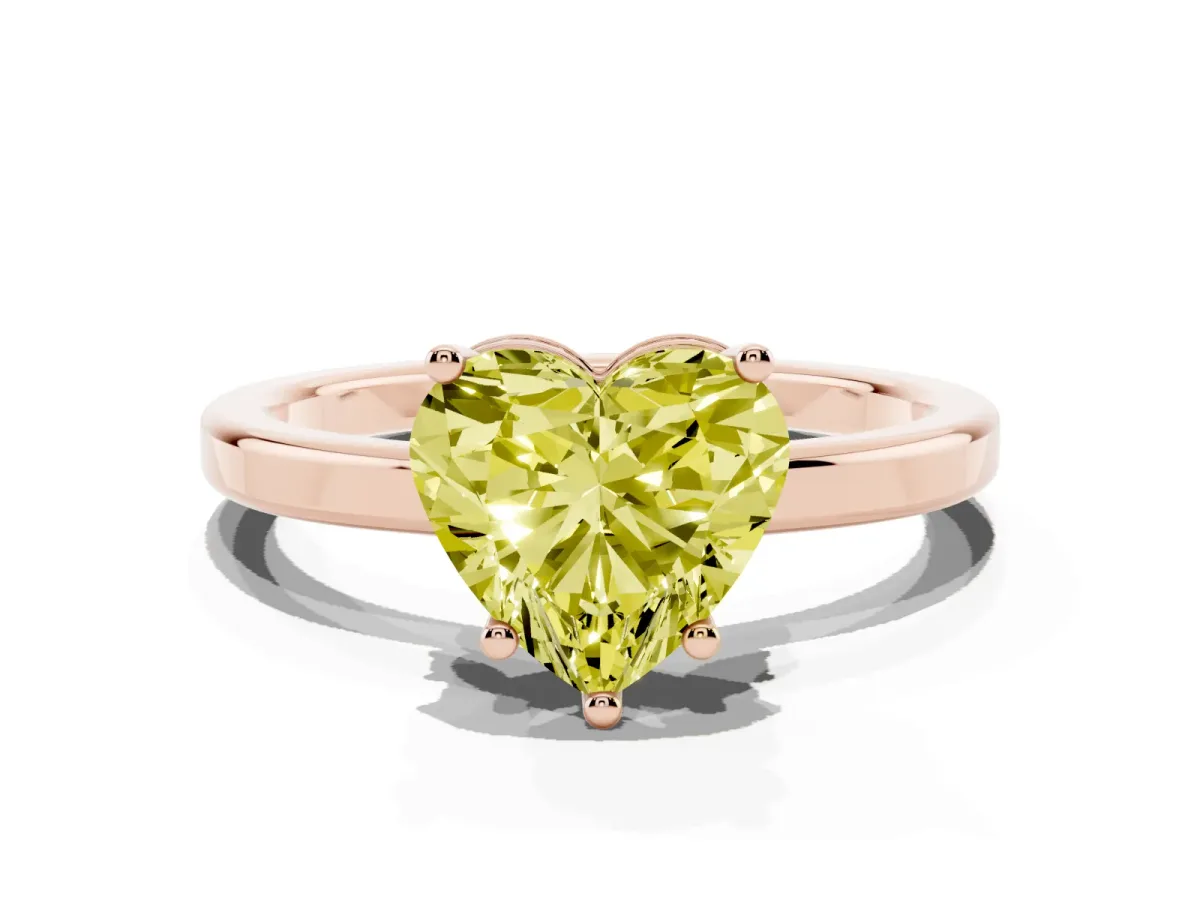 Fancy Yellow Heart Cut Cut Solitaire Engagement Ring with Four-Prong Setting on a Classic Band Rose gold