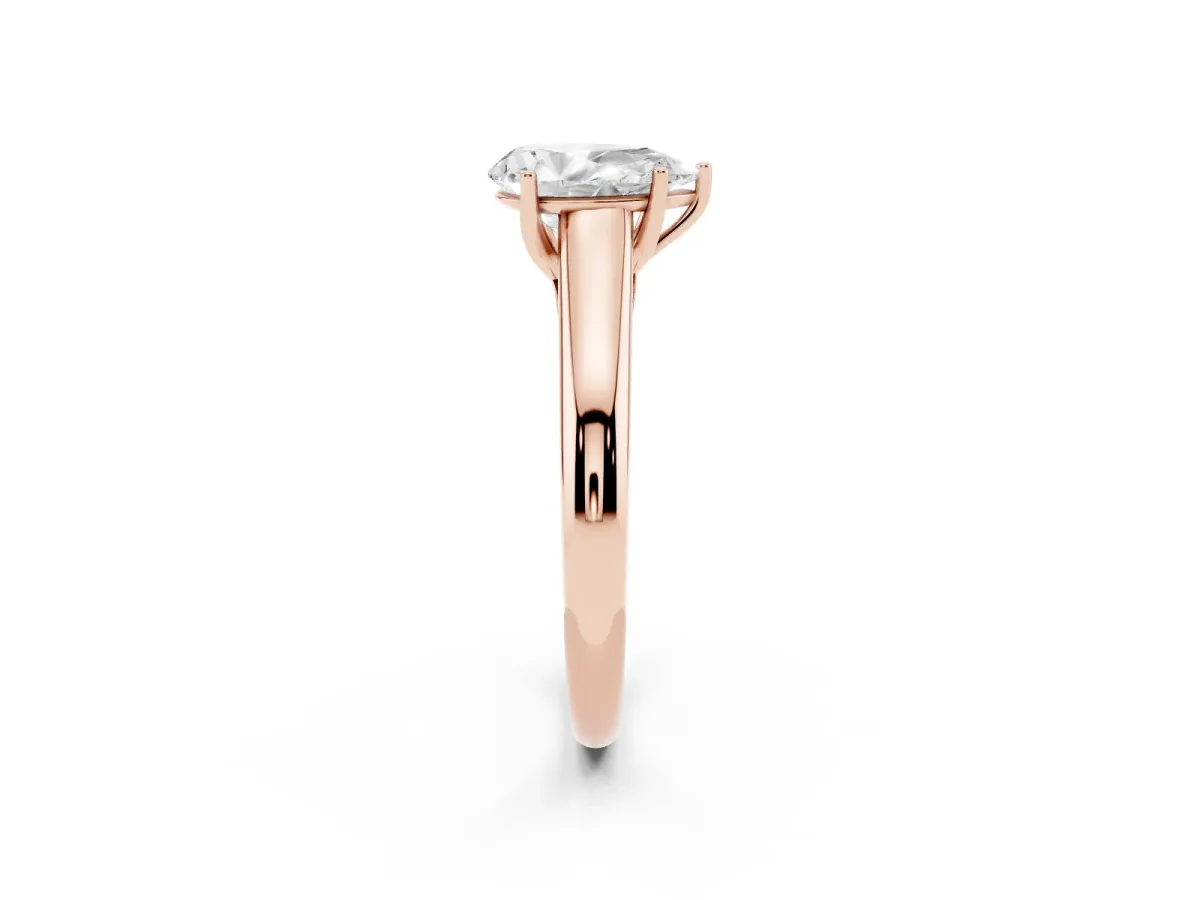 Pear Cut Solitaire Engagement Ring with Tapered Band and Four-Prong Setting Rose gold