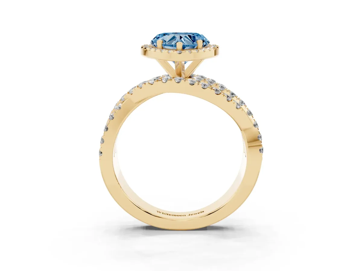 Fancy Blue Heart Cut Diamond Halo Ring with Round Split Shank and Prong Setting Yellow gold
