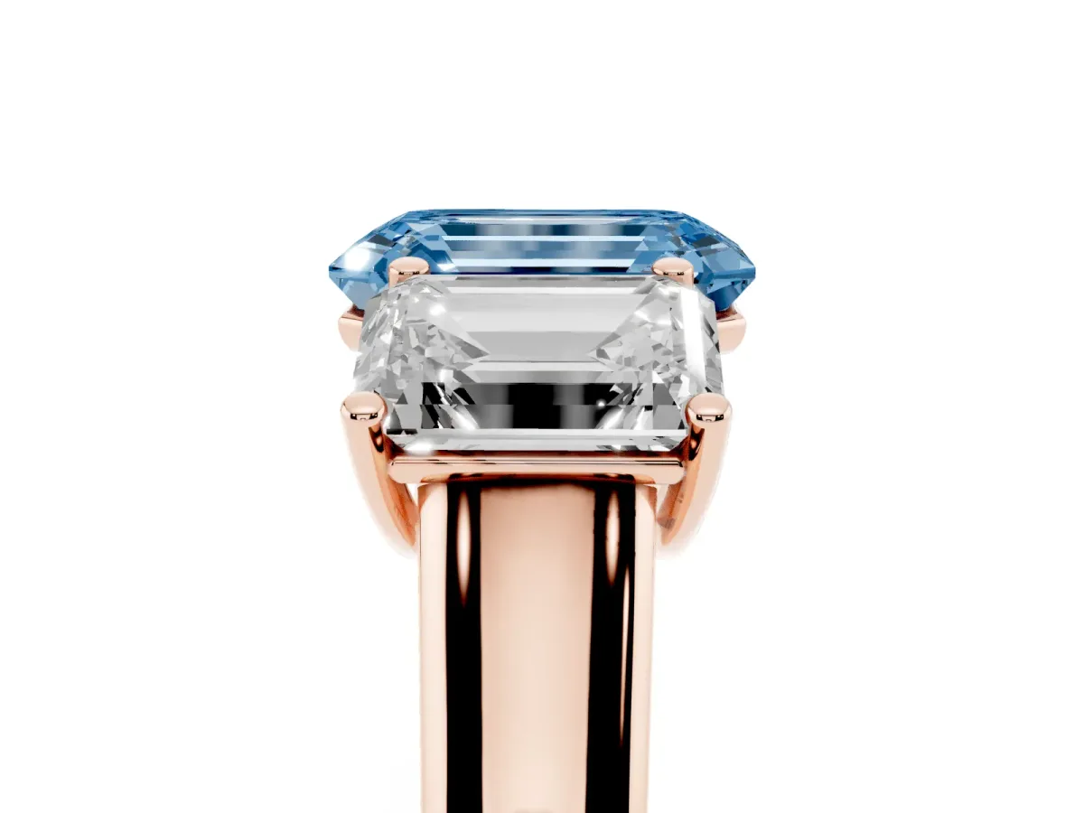 Fancy Blue Emerald Cut Three-Stone Diamond Ring with Prong Setting on a Classic Band Rose gold
