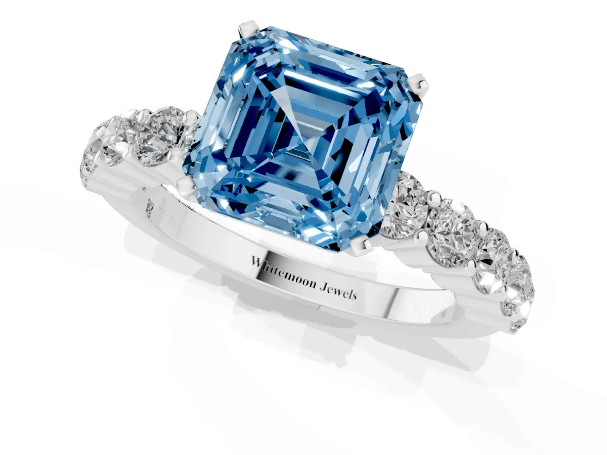 Fancy Blue Asscher Cut Diamond Solitaire Ring with Shared Prong Round Side Stones White gold