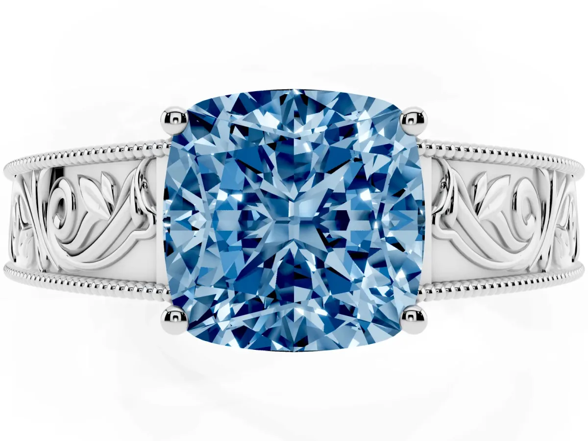 Fancy Blue Cushion Cut Diamond Solitaire Ring with Engraved Band and Four-Prong Setting Platinum