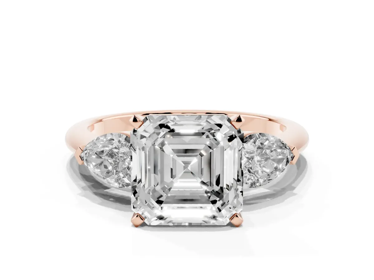Three-Stone Asscher Cut Diamond Ring with Pear Side Stones and Four-Prong Setting Rose gold
