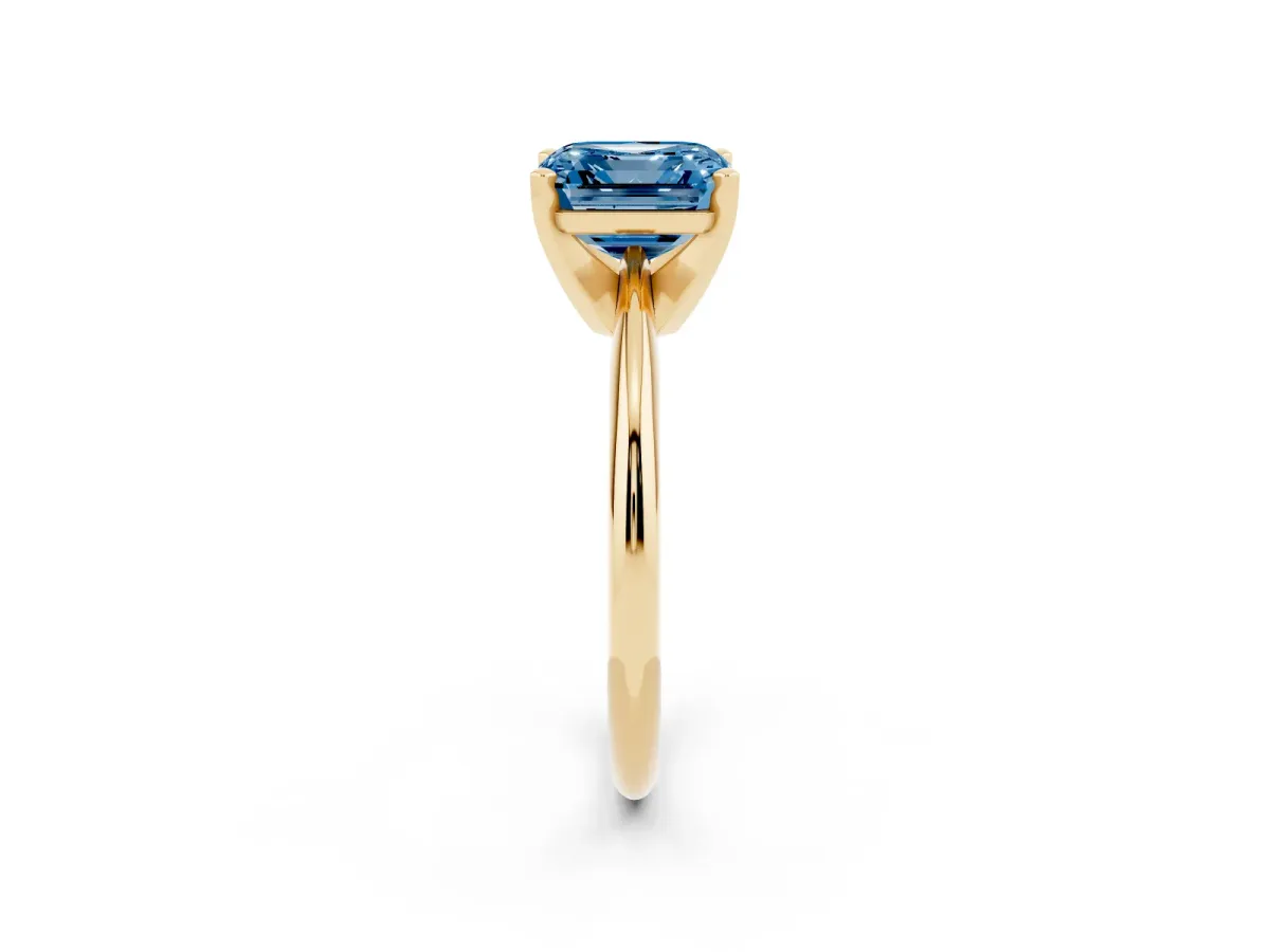 Fancy Blue Asscher Cut Cut Solitaire Ring with Four-Prong Setting on a Classic Band Yellow gold