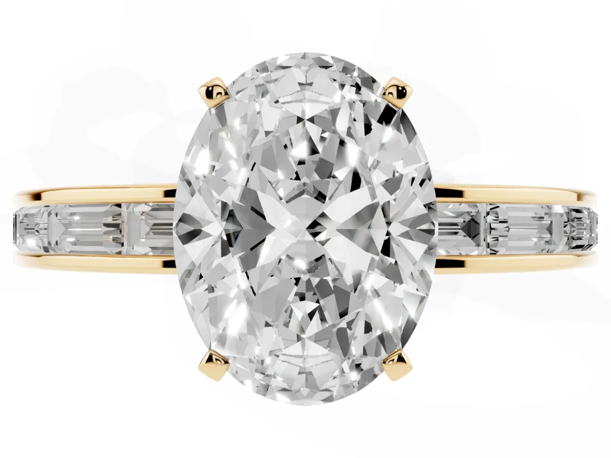 Oval Cut Solitaire Diamond Ring with Channel-Set Baguette Band and Four-Prong Setting Yellow gold
