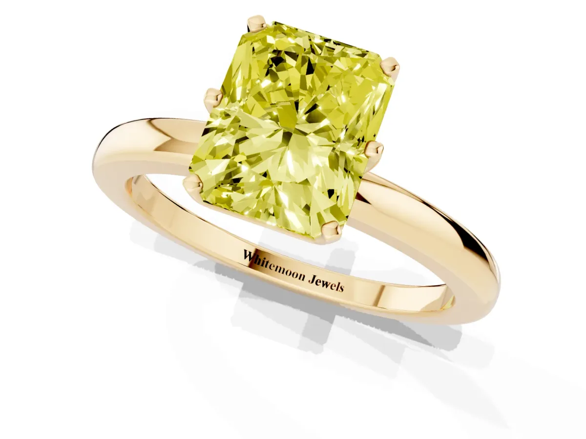 Fancy Yellow Radiant Cut Solitaire Diamond Ring with Six-Prong Setting on a Classic Band Yellow gold