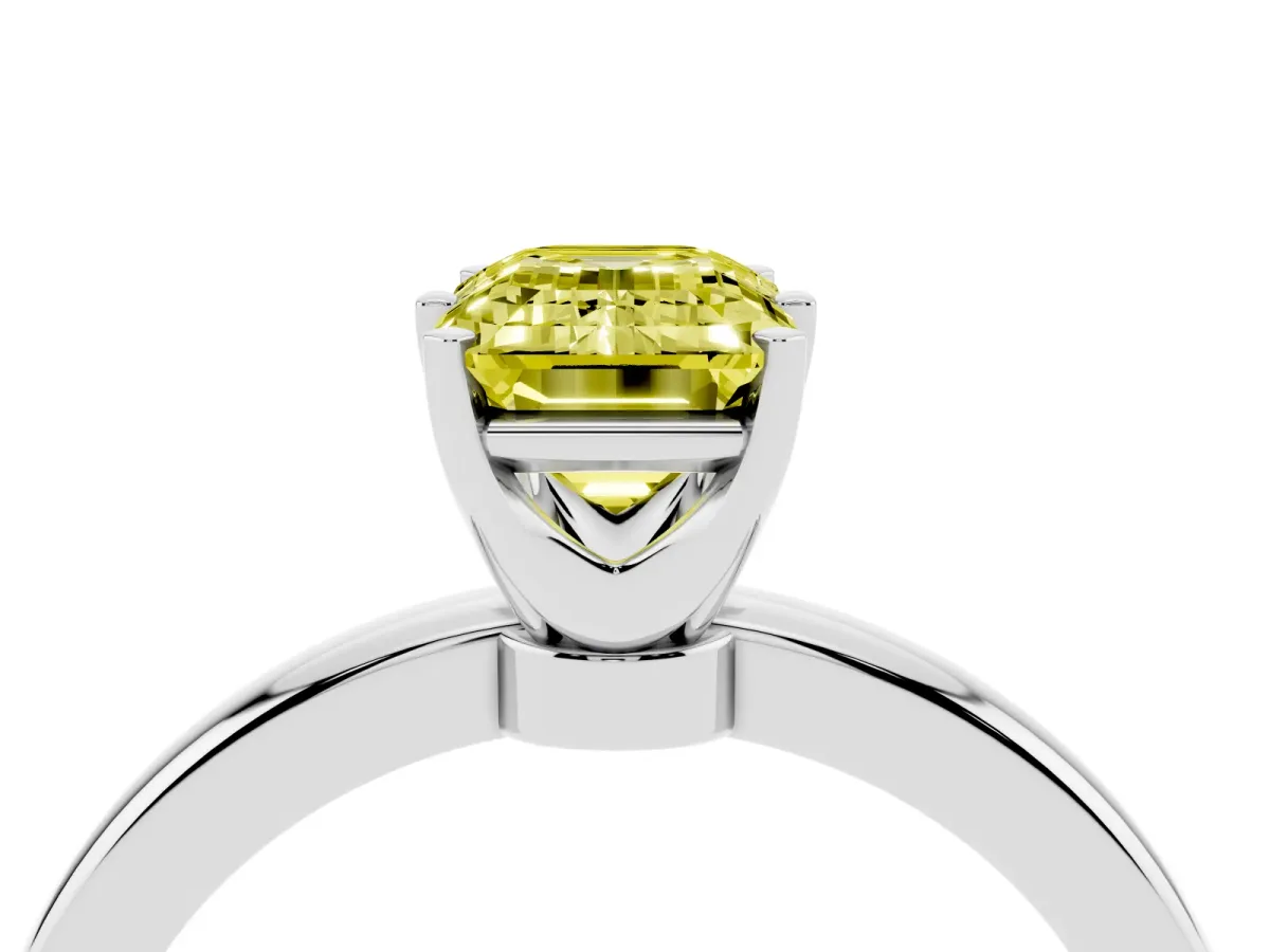Fancy Yellow Emerald Cut Solitaire Diamond Ring with Six-Prong Setting on a Classic Band Platinum