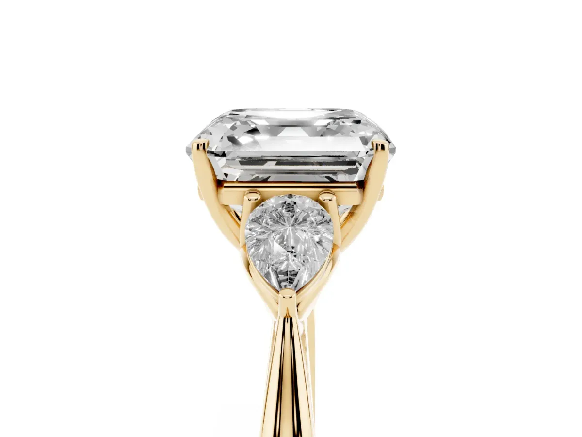 Three-Stone Asscher Cut Brilliant Diamond Solitaire Ring with Tapered Band and Four-Prong Setting Yellow gold