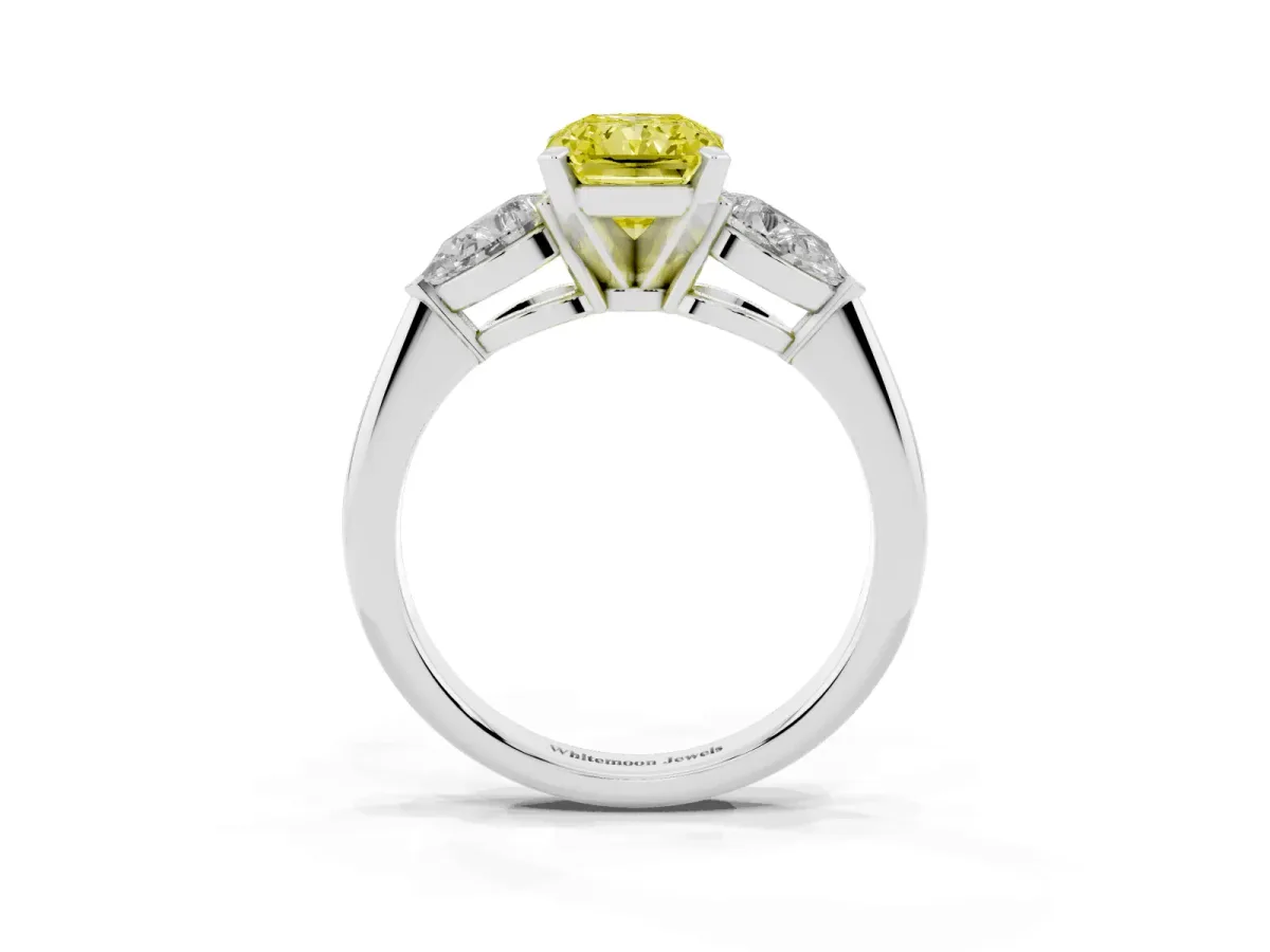 Fancy Yellow Three-Stone Radiant Cut Diamond Ring with Pear Side Stones and Four-Prong Setting Silver