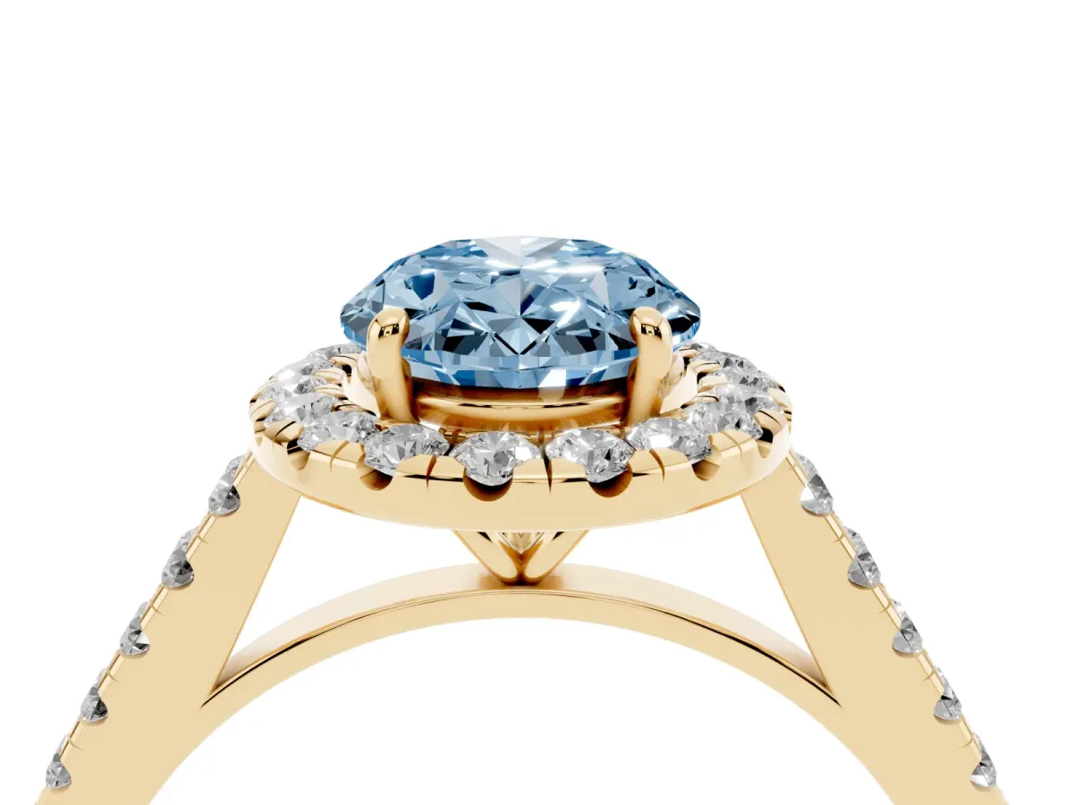 Fancy Blue Oval Cut Halo Pave Diamond Engagement Ring with Four-Prong Setting Yellow gold