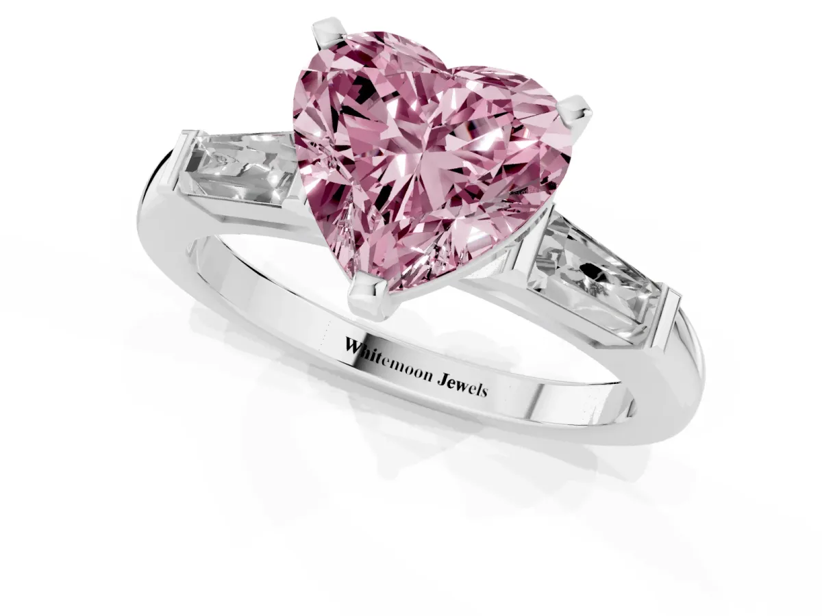Fancy Pink Heart Cut Solitaire with Tapered Baguette Side Stones on a Classic Band with Four-Prong Setting Silver