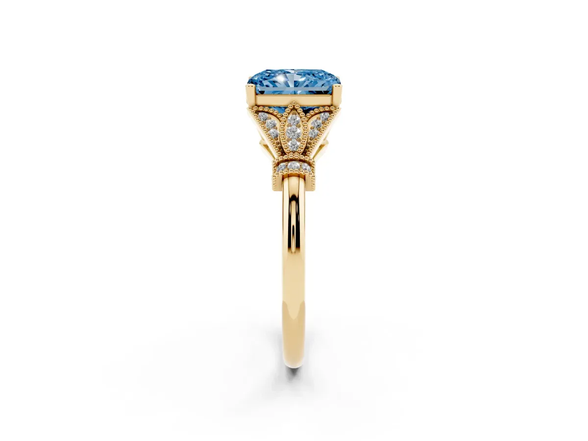 Fancy Blue Radiant Cut Diamond Solitaire Ring with Floral Filigree and Pave Accents Yellow gold