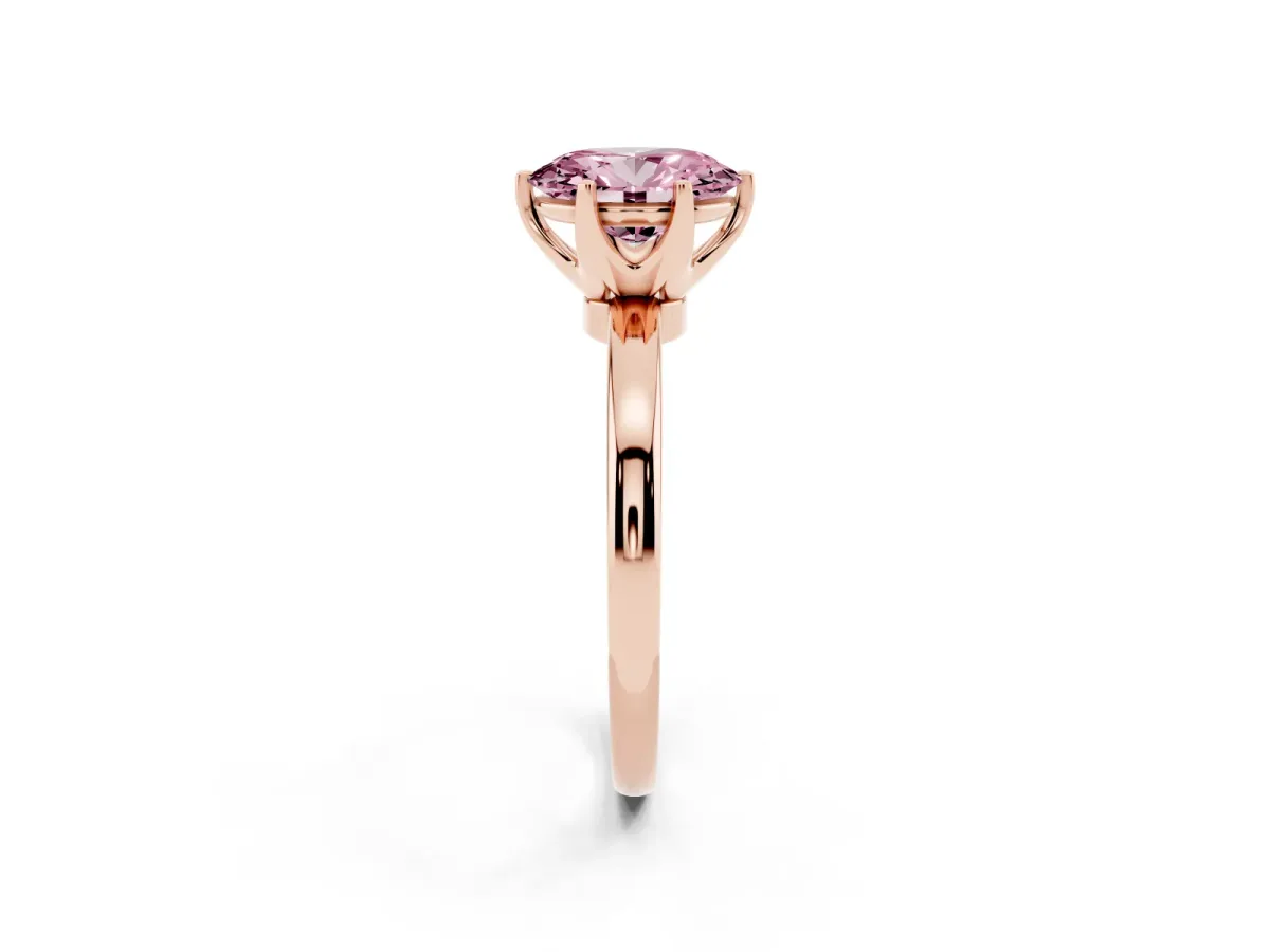 Fancy Pink Oval Cut Solitaire Diamond Ring with Six-Prong Setting on a Classic Band Rose gold