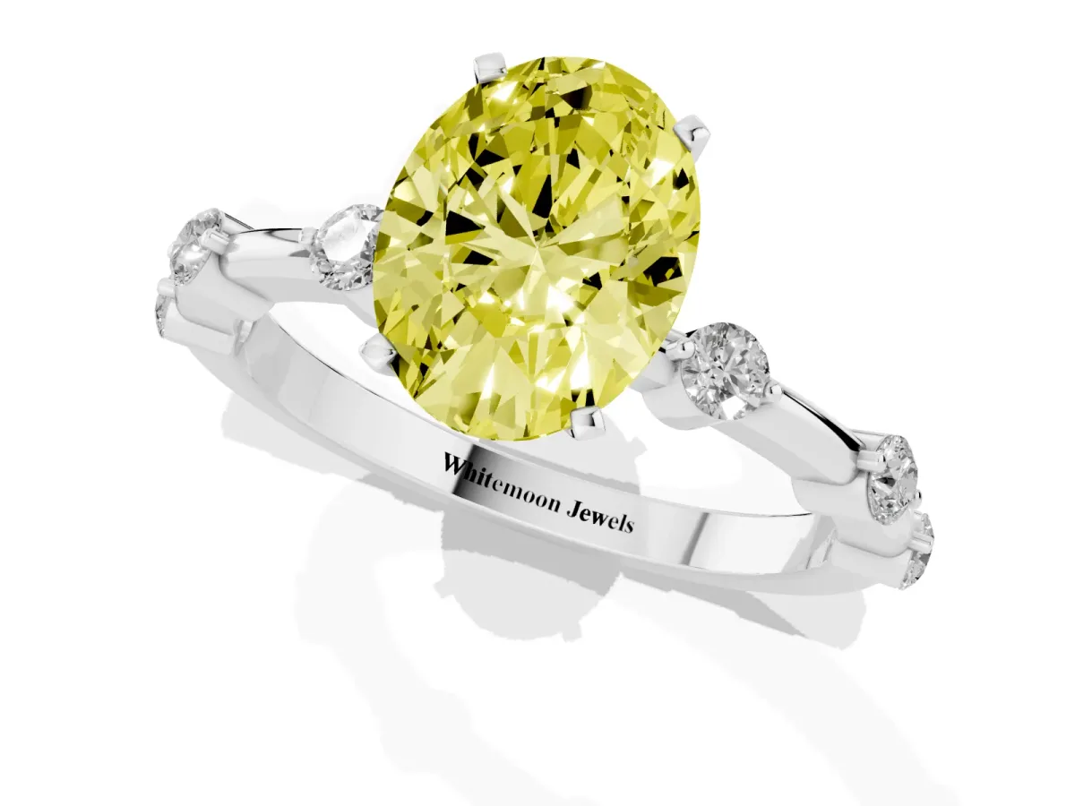 Fancy Yellow Oval Cut Solitaire Diamond Ring with Bezel Set Side Stones and Prong Setting Silver