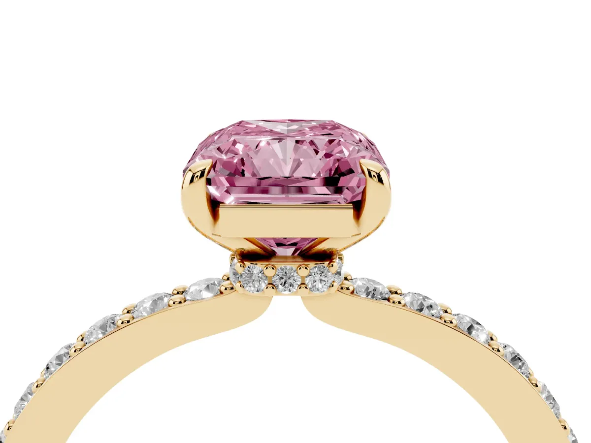 Fancy Pink Radiant Cut Diamond Pavé Engagement Ring with Round Accents and Prong Setting Yellow gold