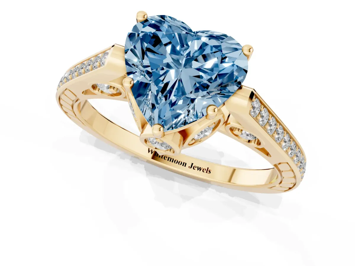 Fancy Blue Heart Cut Cut Cathedral Pave Diamond Engagement Ring with Six-Prong Setting Yellow gold