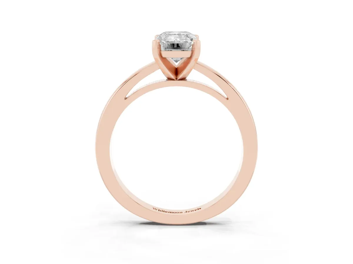 Emerald Cut Solitaire Diamond Engagement Ring with Four-Prong Setting on a Classic Band Rose gold