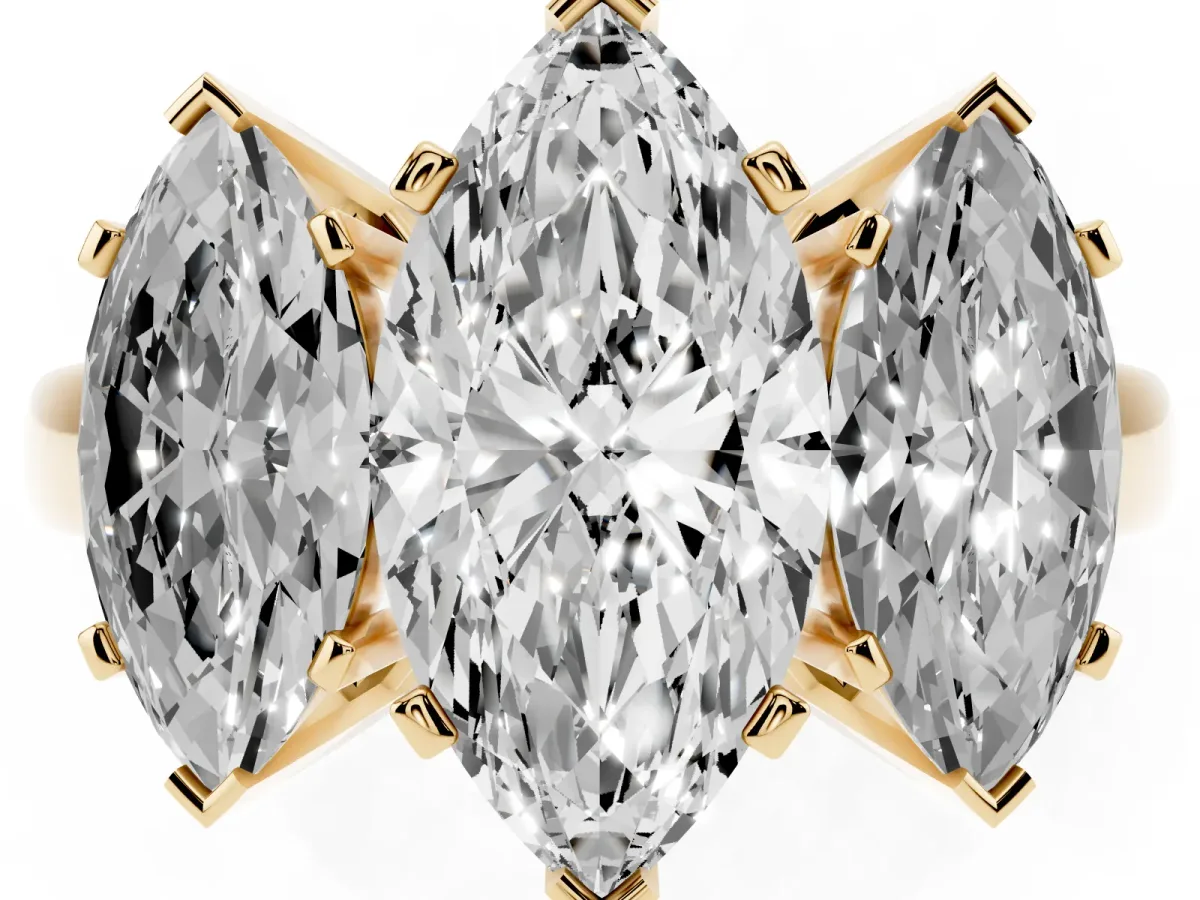 Three-Stone Marquise Cut Cut Diamond Ring with Channel Set Band and Four-Prong Setting Yellow gold