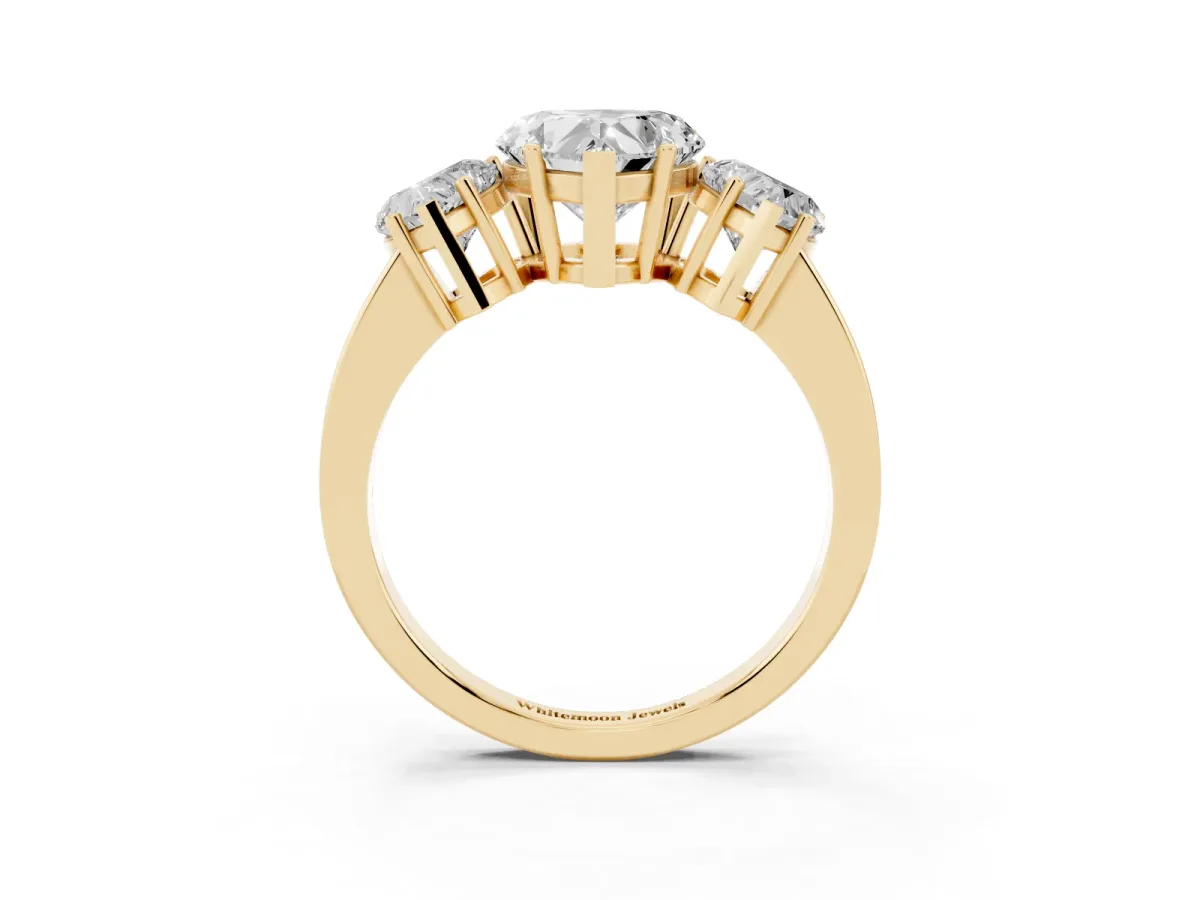 Three-Stone Heart Cut Cut Diamond Engagement Ring with Flat Band and Four-Prong Setting Yellow gold