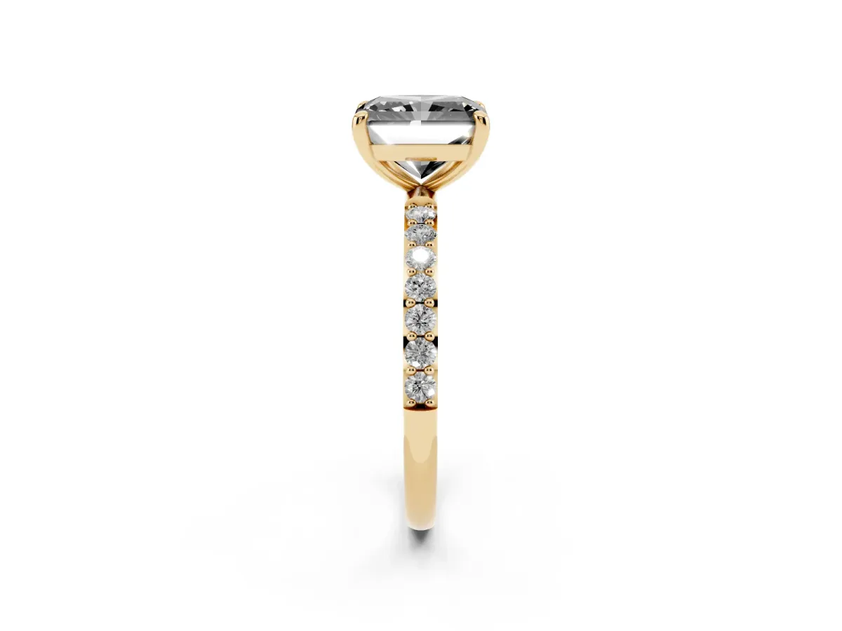 Fancy Black Radiant Cut Diamond Solitaire Ring with Round Pavé Band and Prong Setting Yellow gold
