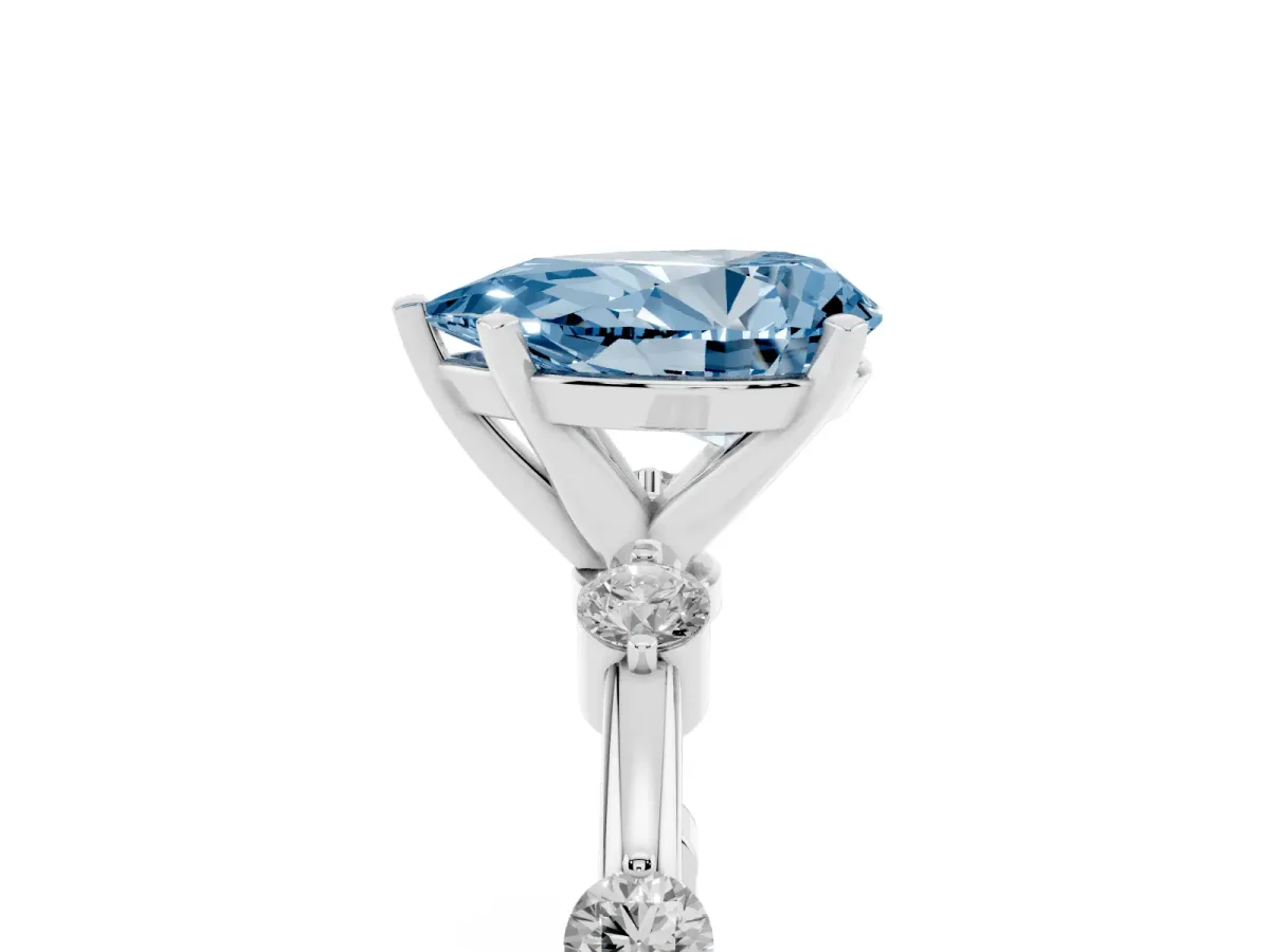 Fancy Blue Pear Cut Solitaire Diamond Ring with Bezel Set Side Stones and Prong Setting Platinum