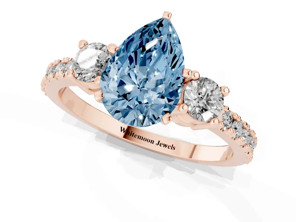 Fancy Blue Pear Cut Three-Stone Diamond Pavé Band with Prong Setting Rose gold