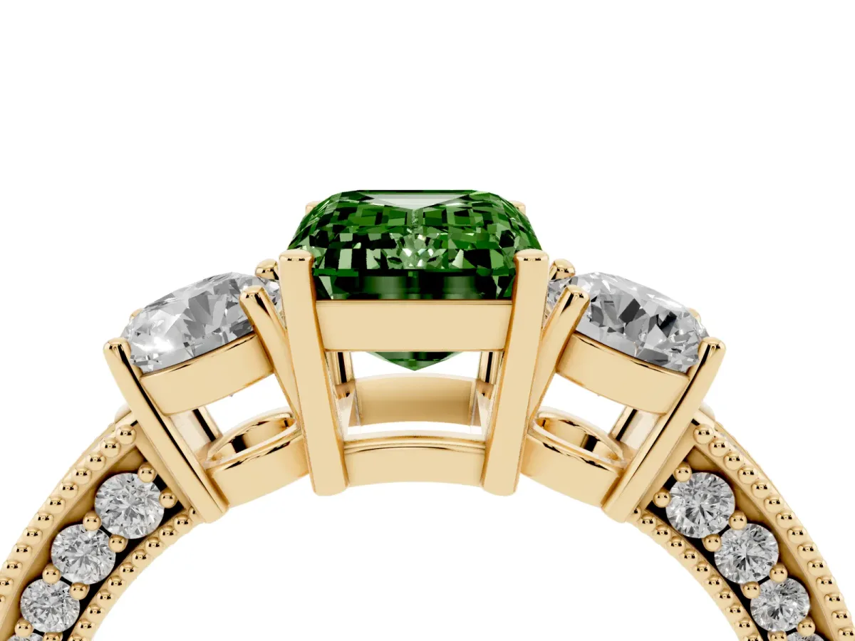 Fancy Green Emerald Cut Three-Stone Diamond Ring with Pavé Band and Four-Prong Setting Yellow gold