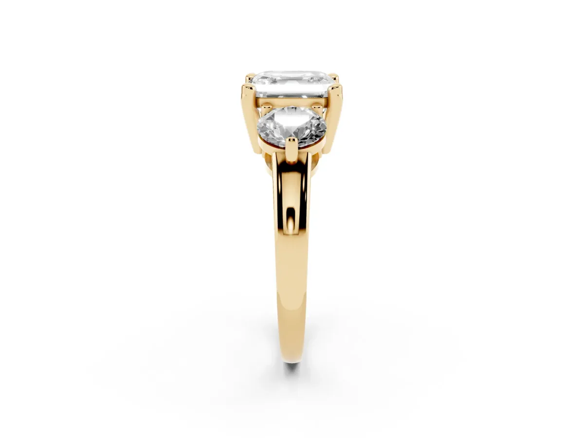 Three-Stone Asscher Cut Brilliant Cut Solitaire Ring with Prong Setting on a Classic Band Yellow gold