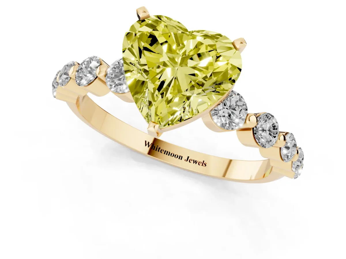 Fancy Yellow Heart Cut Solitaire Diamond Ring with Pave Band and Four-Prong Setting Yellow gold