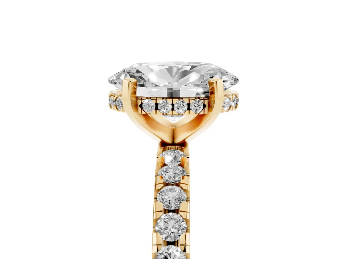 Oval Cut Diamond Solitaire Ring with Round Pavé Band and Four-Prong Setting Yellow gold