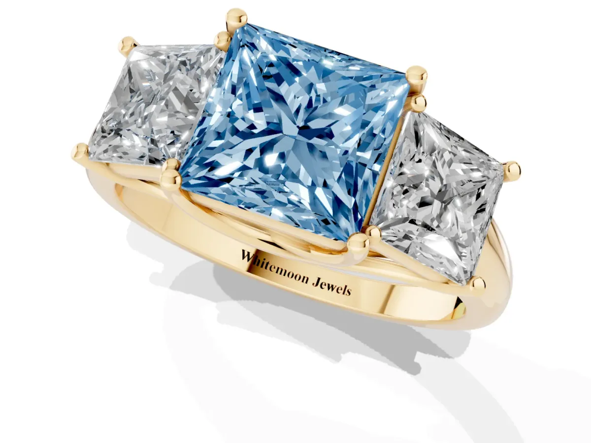 Fancy Blue Three-Stone Princess Cut Diamond Engagement Ring with Prong Setting Yellow gold