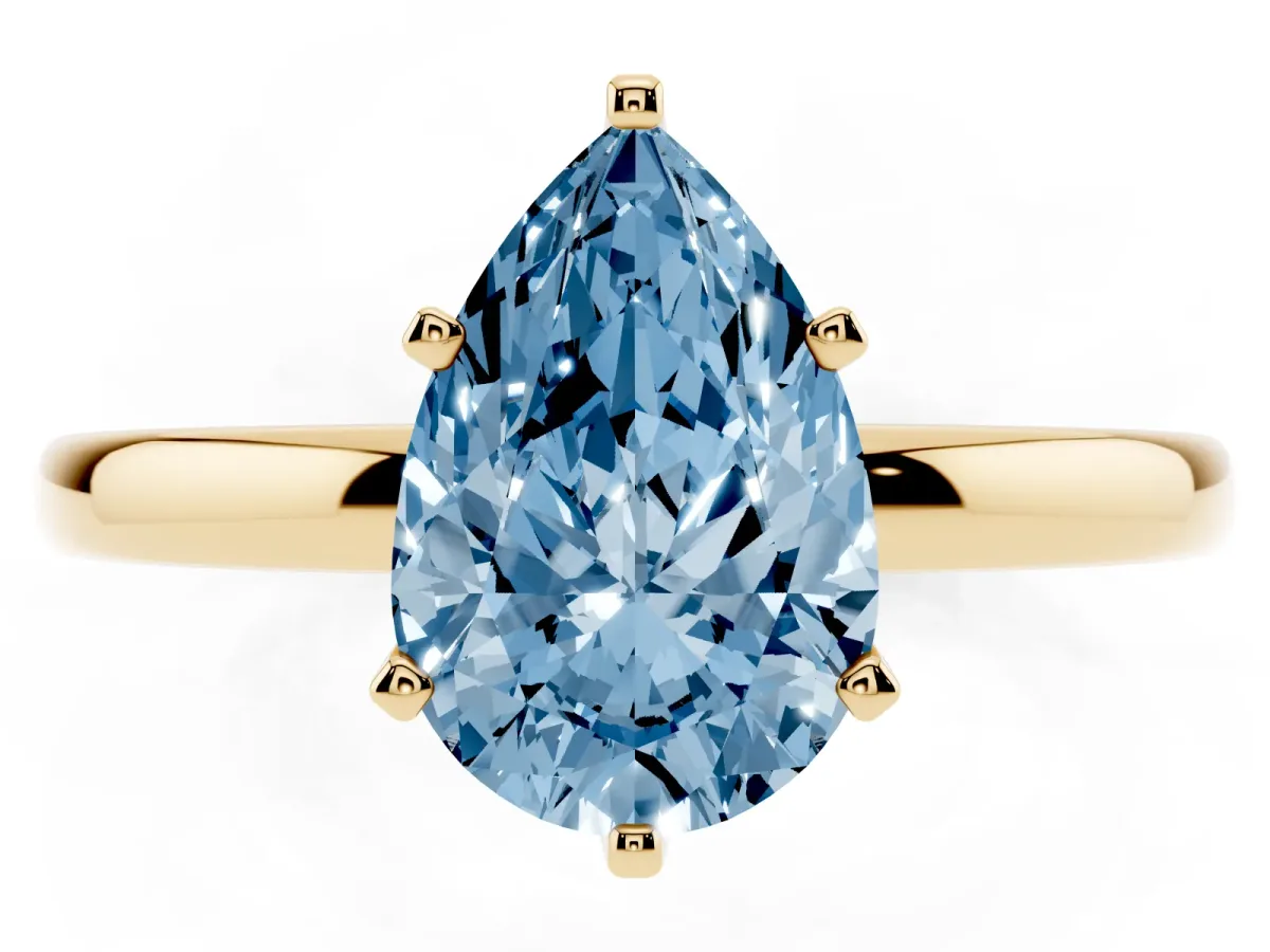 Fancy Blue Pear Cut Solitaire Diamond Ring with Six-Prong Setting on a Classic Band Yellow gold