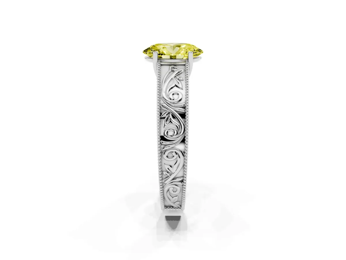 Fancy Yellow Oval Cut Diamond Solitaire Ring with Engraved Band and Four-Prong Setting Silver