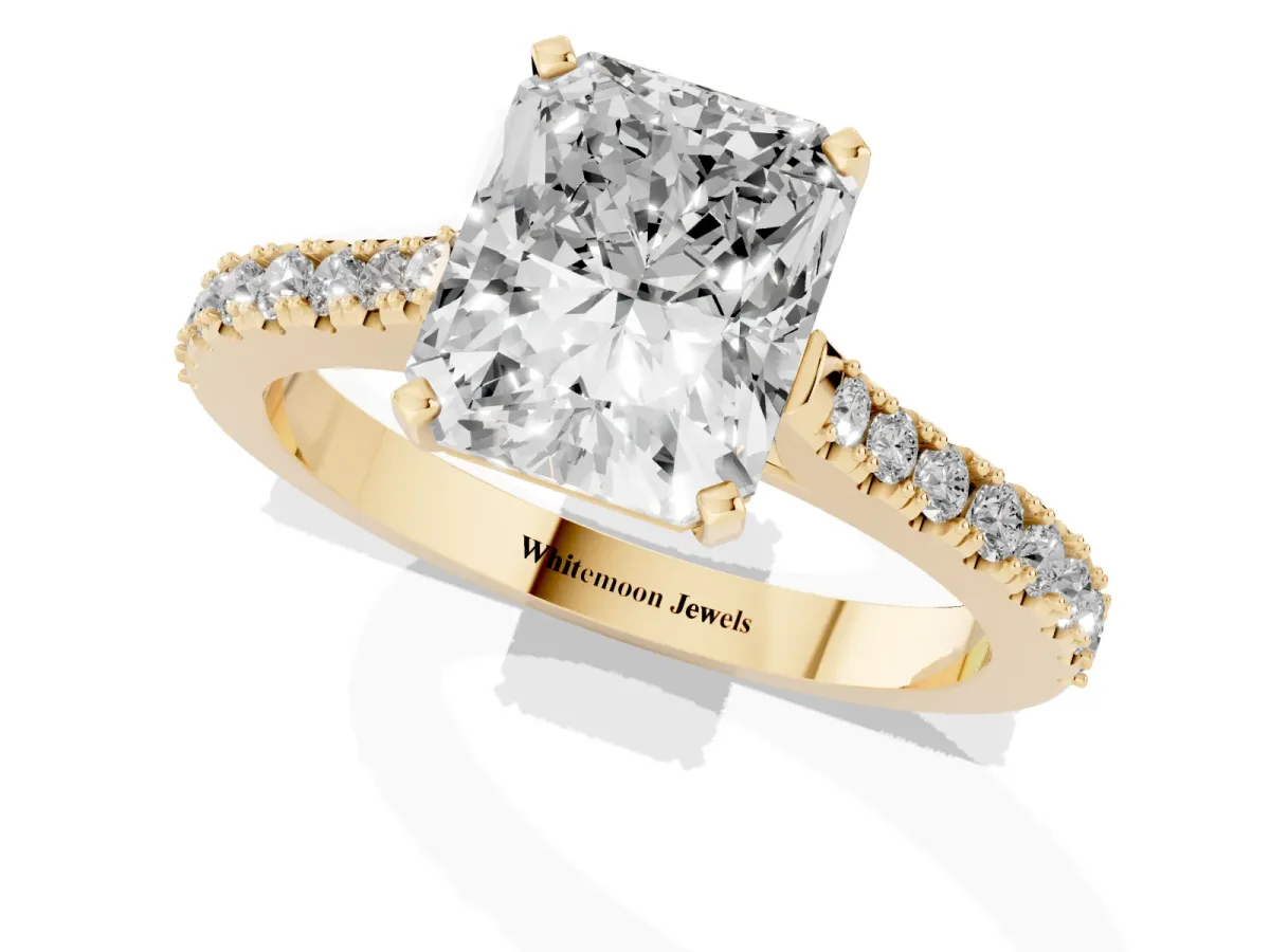 Radiant Cut Cut Solitaire Diamond Engagement Ring with Pave Band and Four-Prong Setting Yellow gold