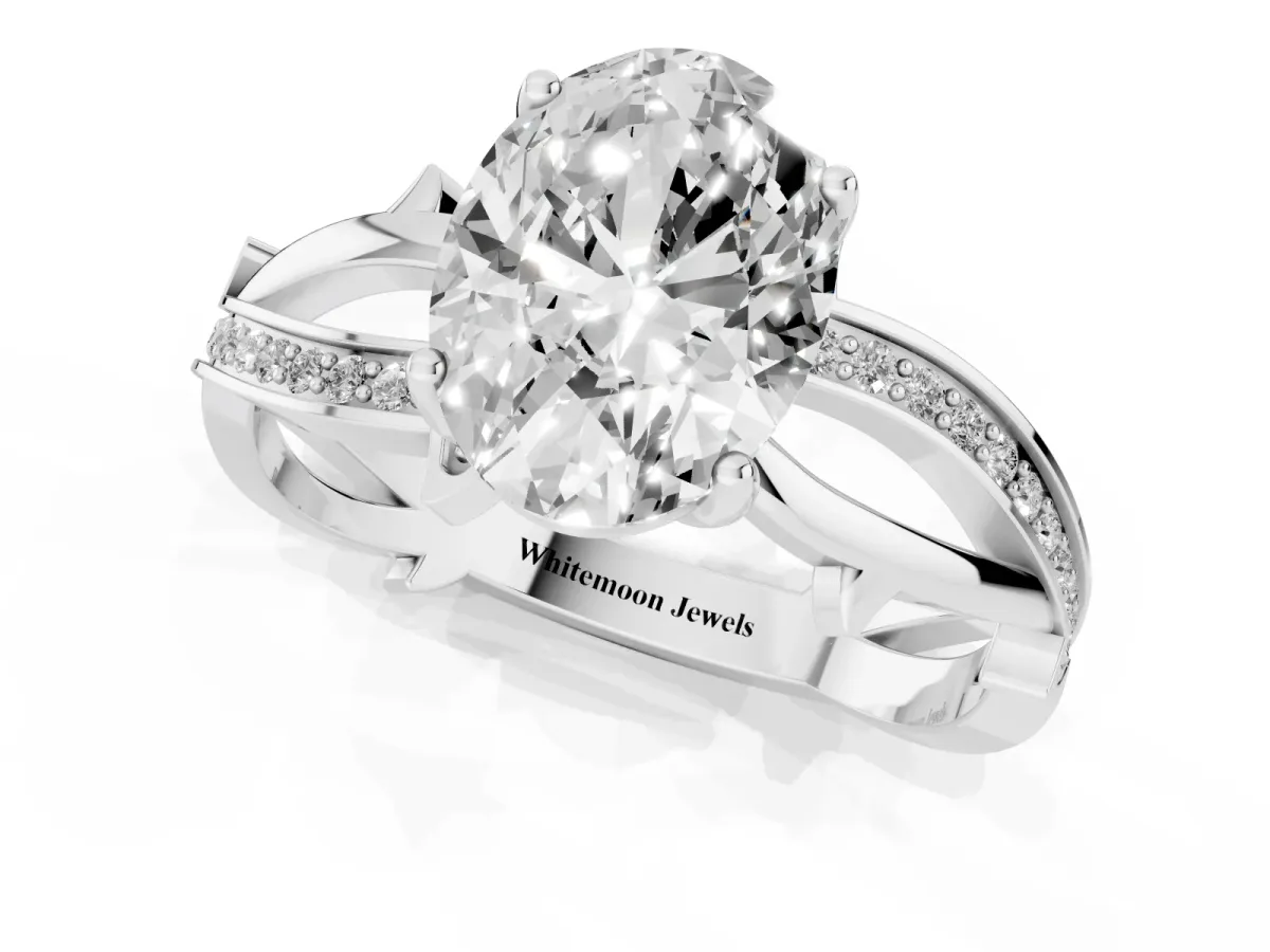 Oval Cut Solitaire Twist Band with Pavé Accents and Four-Prong Setting Silver