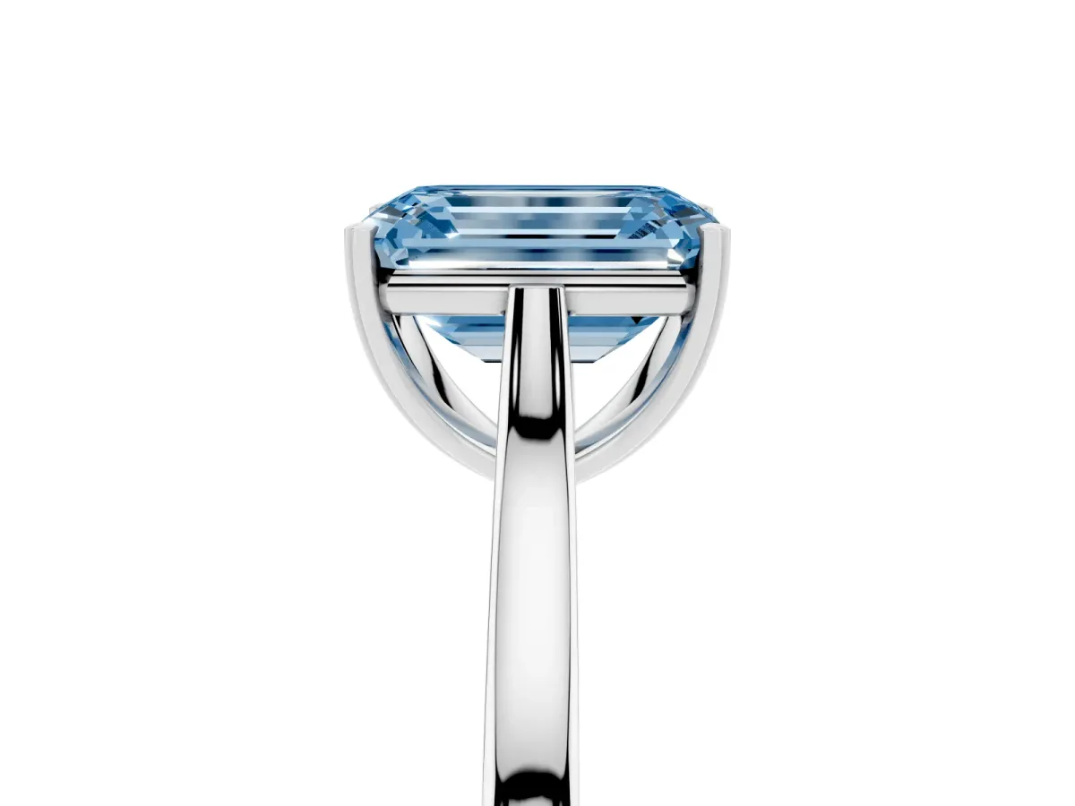 Fancy Blue Emerald Cut Solitaire Heart Prong Engagement Ring with Tapered Band Silver