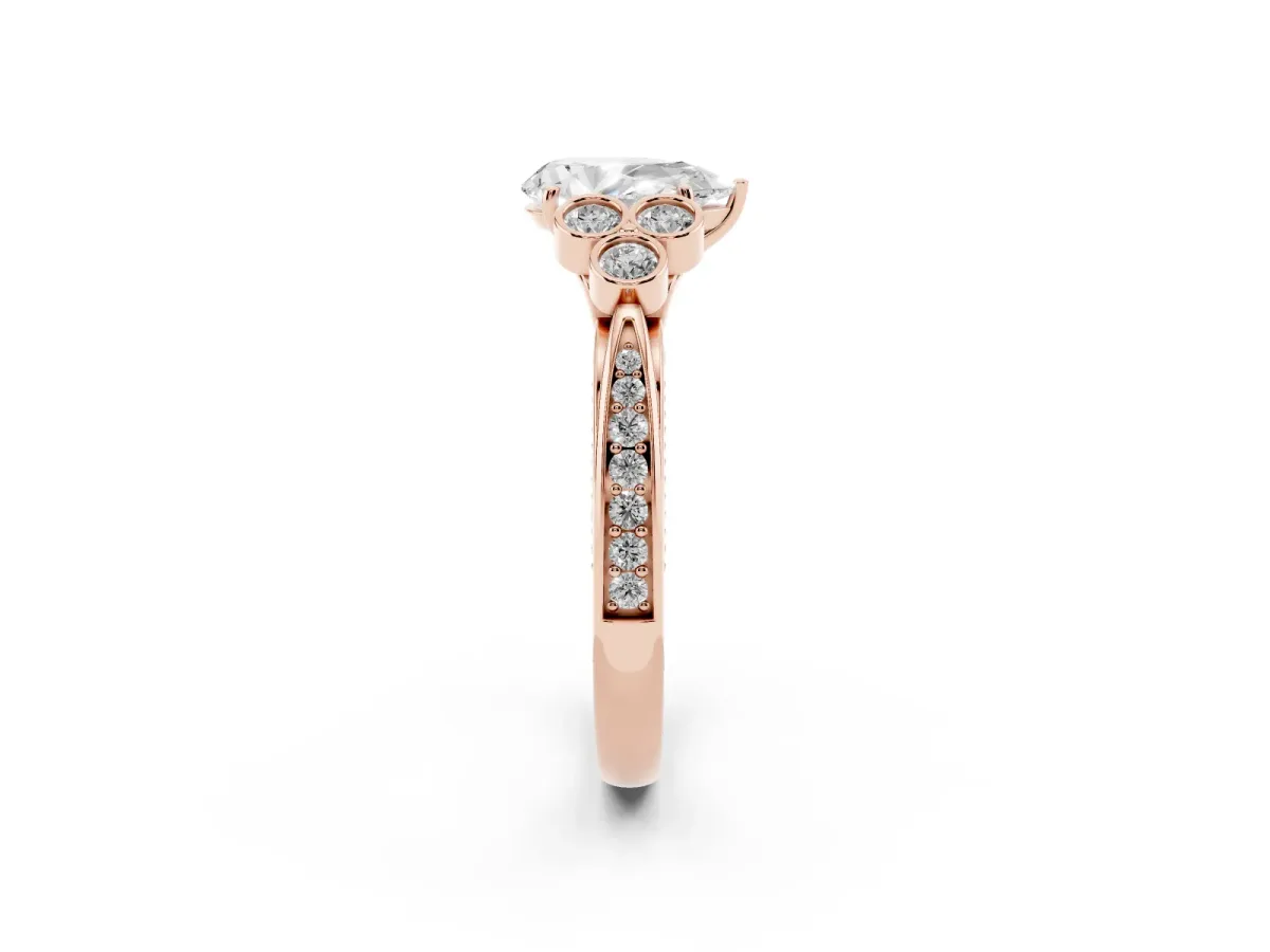 Pear Cut Cut Diamond Engagement Ring with Bezel Set Round Side Stones and Prong Setting Rose gold