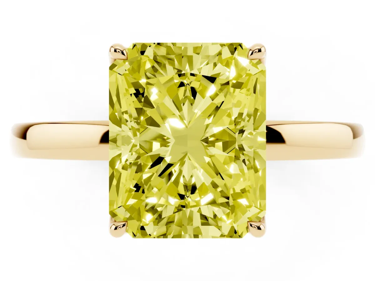 Fancy Yellow Radiant Cut Diamond Solitaire Ring with Thin Band and Prong Setting Yellow gold