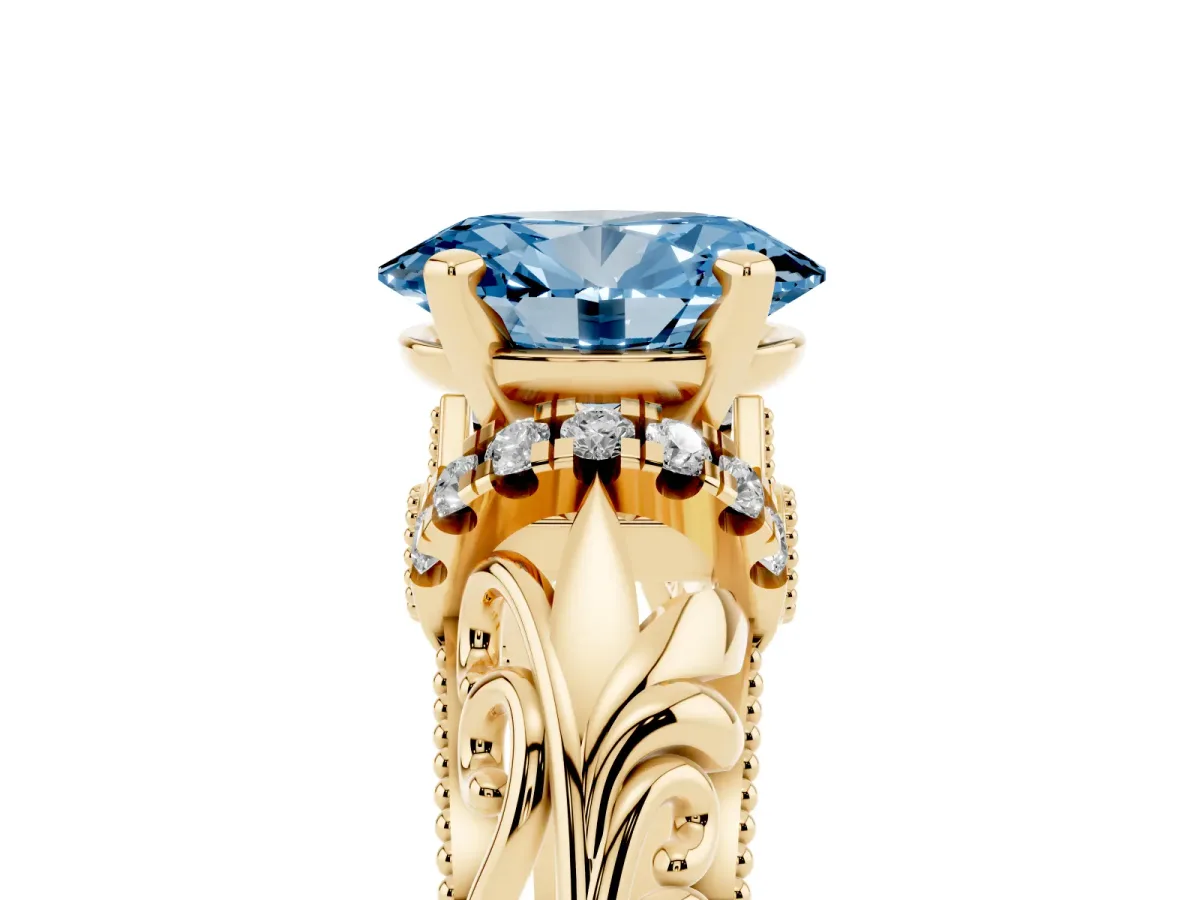 Fancy Blue Oval Cut Solitaire Filigree Engagement Ring with Halo and Prong Setting Yellow gold