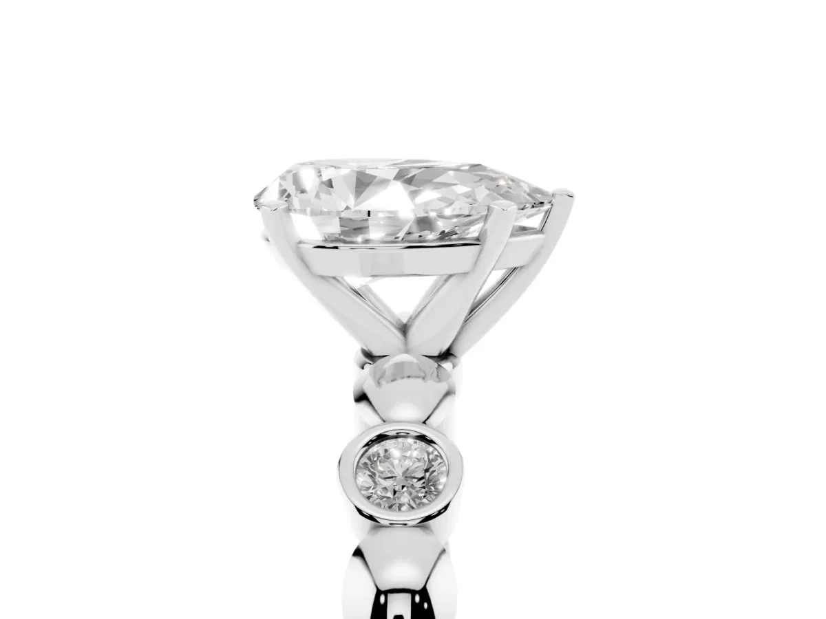 Pear Cut Solitaire Bezel-Set Diamond Ring with Beaded Band and Four-Prong Setting Silver
