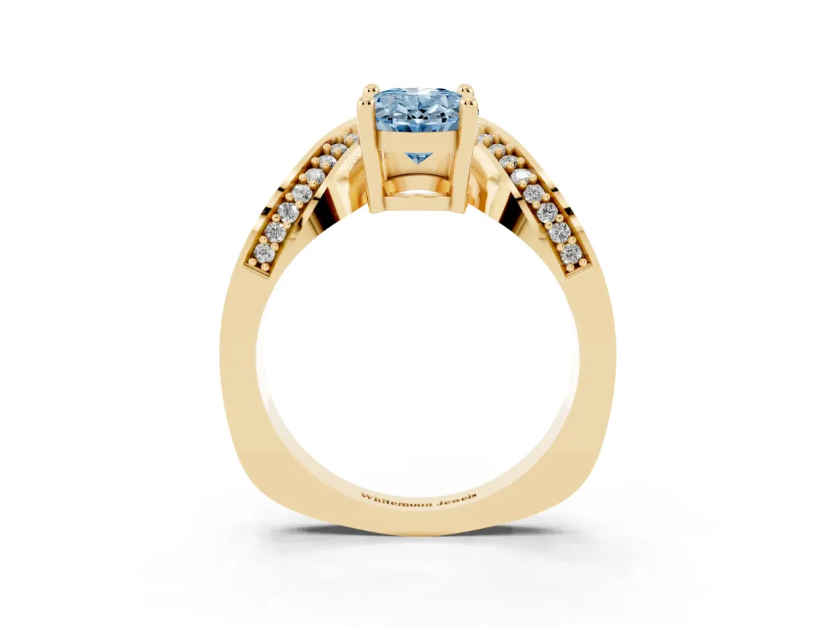 Fancy Blue Oval Cut Solitaire Diamond Engagement Ring with Pave Band and Four-Prong Setting Yellow gold