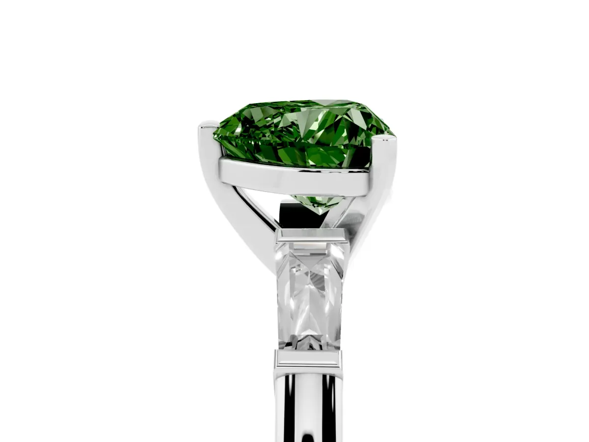 Fancy Green Heart Cut Solitaire with Tapered Baguette Side Stones on a Classic Band with Four-Prong Setting Silver